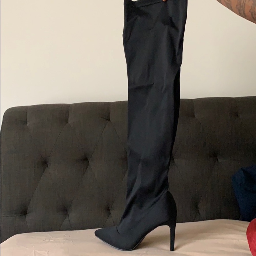 Over the knee heeled boot
